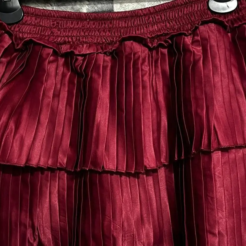 Garment finishing detail: pleat
