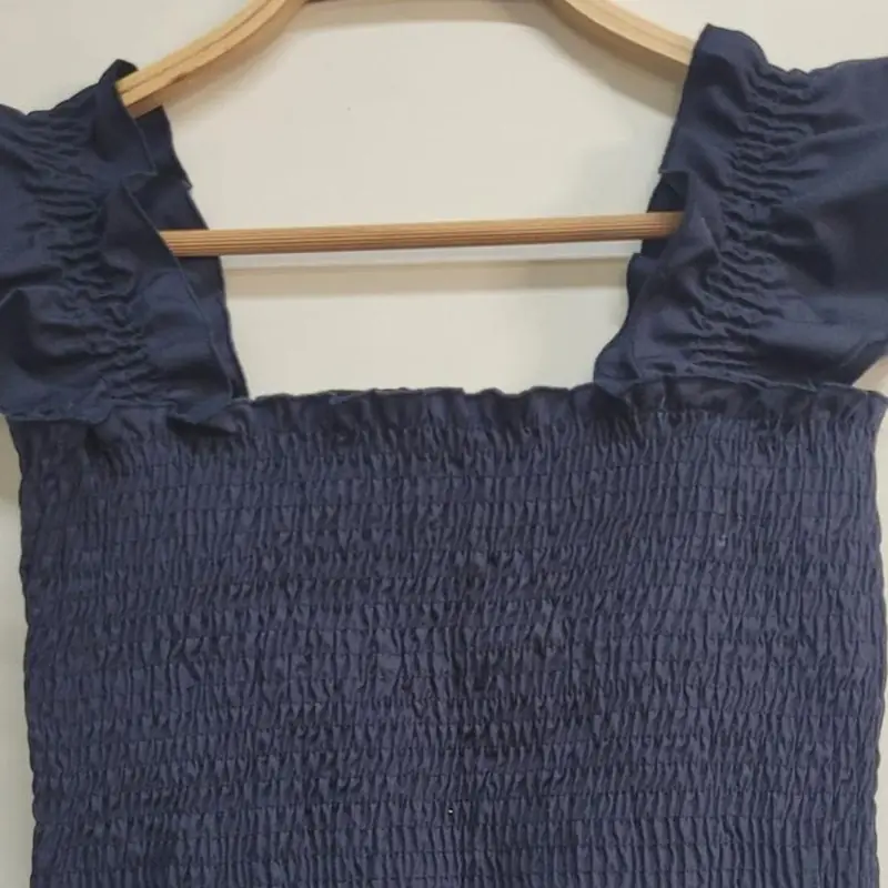 Garment finishing detail: smock